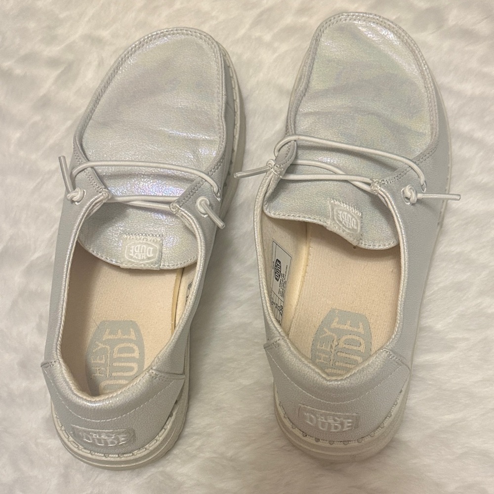 Hey Dude Women’s Iridescent White Slip-On Sneakers